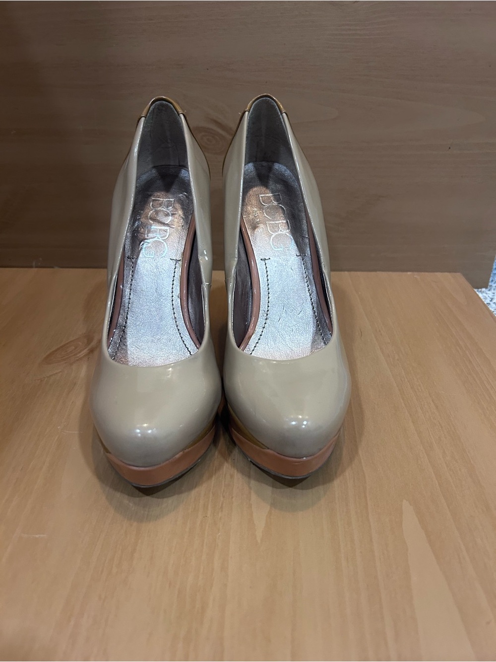 BCBG Nude Patent Platform Pumps with Tan Accent
